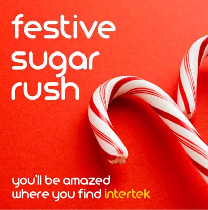 Candy cane against a red wall